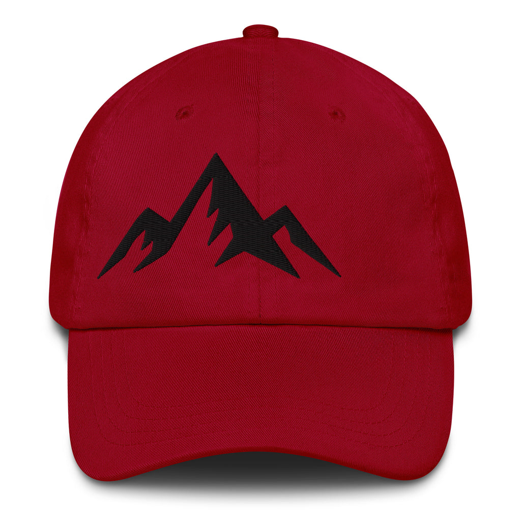 Red cap with minimal embroidered black design on a white background (front).